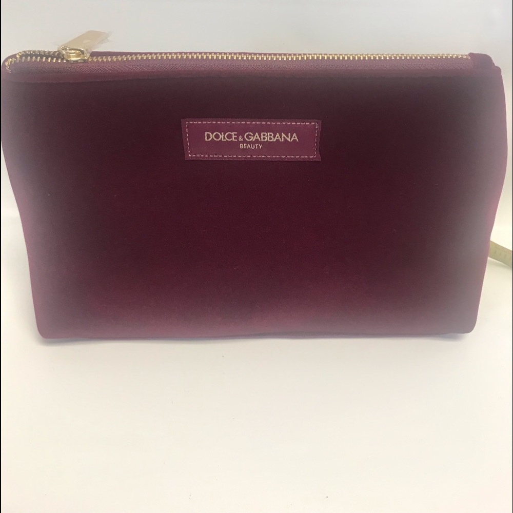 Dolce & Gabbana cosmetic bag.